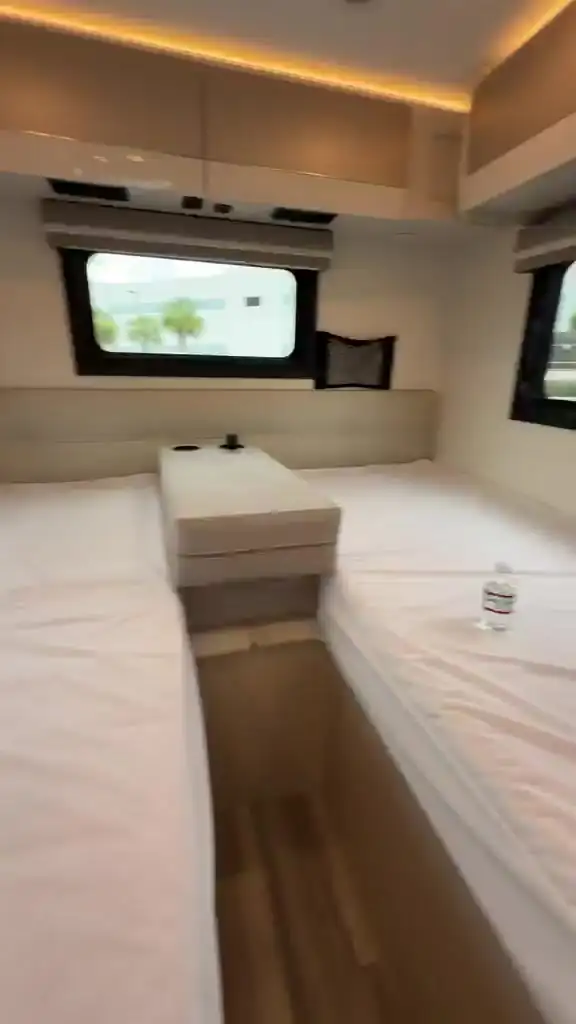 Reclining seats with fold-out tables in the living area